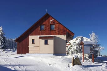 Cottages Na bílé stopě in the winter