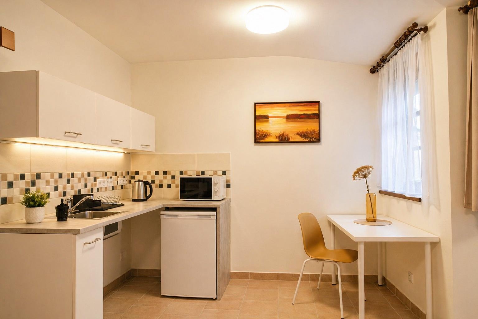 Rodinný apartmán 2 Dvoulůžkové studio s 2 přistýlkami - Penzion V Podzámčí - bezbariérové apartmány