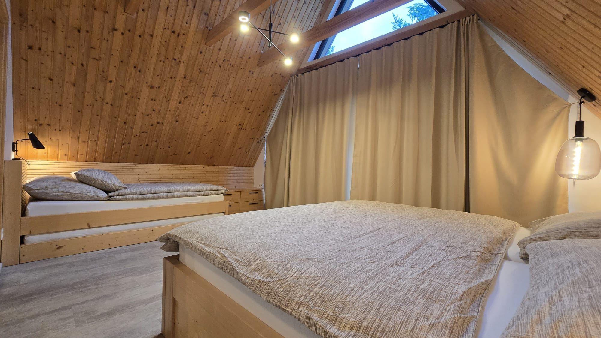 Třílůžkový pokoj  - Wellness Chata Dája