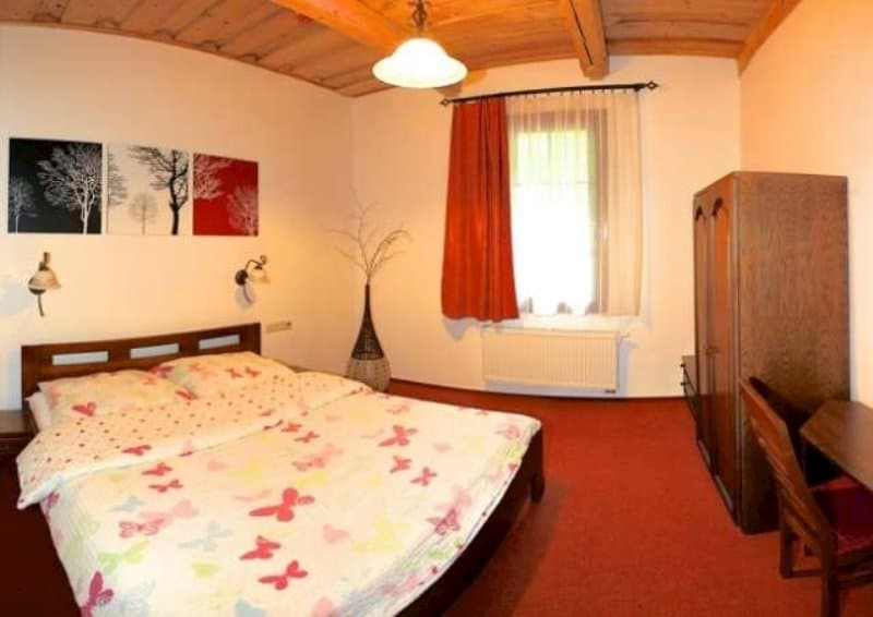 Spálňa v apartmáne - Penzión s reštauráciou Banská Klopačka