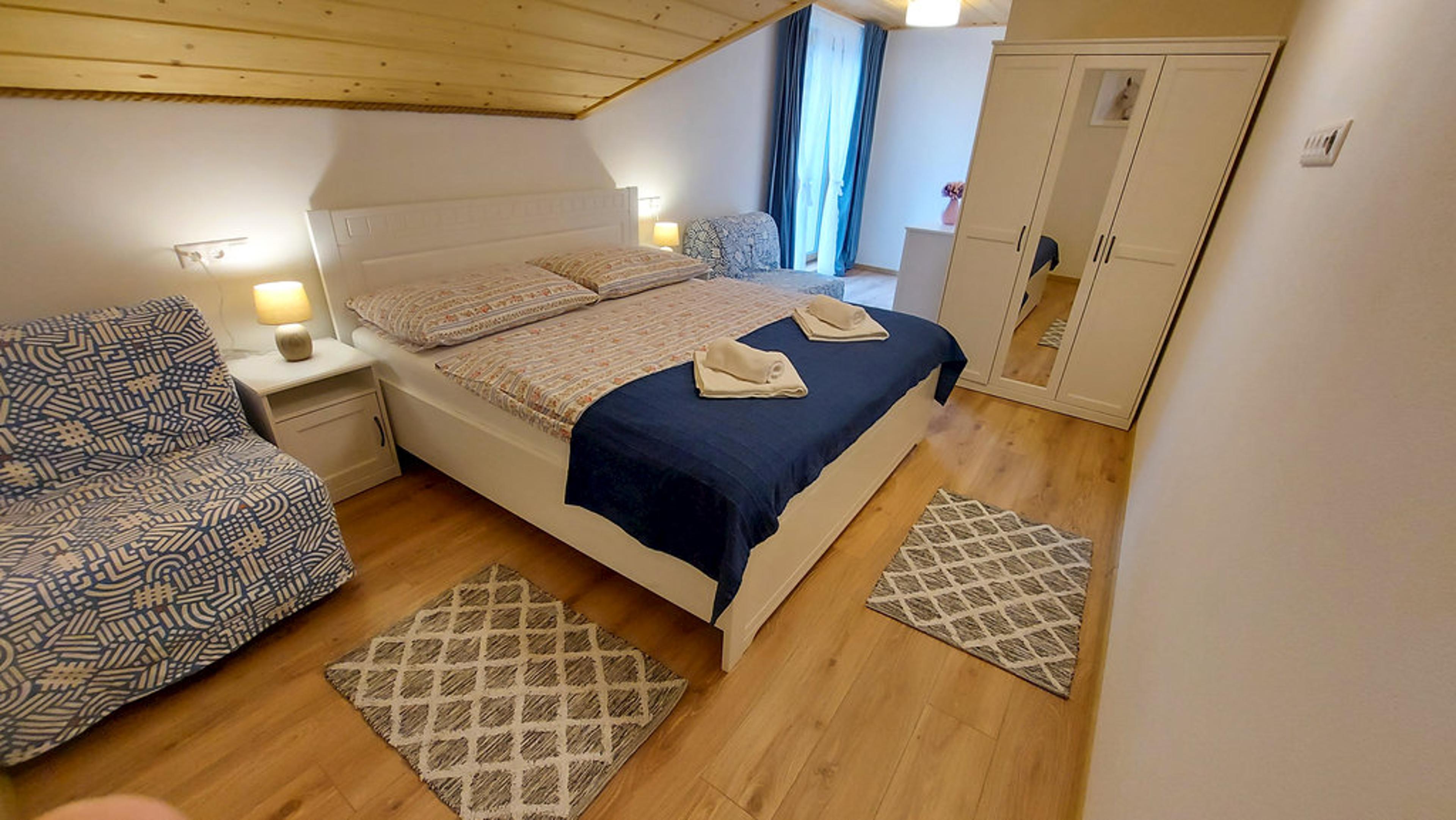 Štvorlôžková izba Štvorlôžková izba s 2 prístelkami - Chata na Lovisku Kubínska hoľa